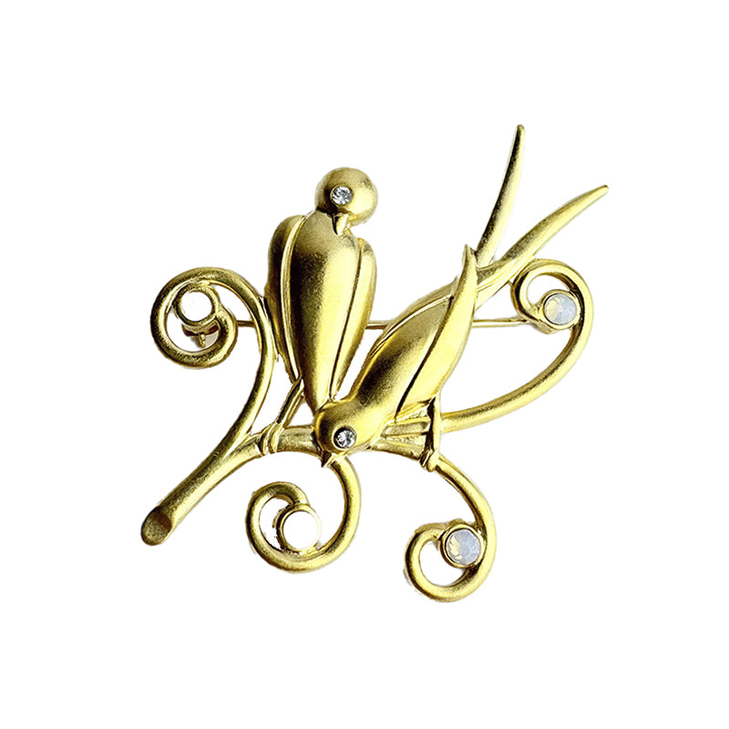 Broche Sur la branche dorée